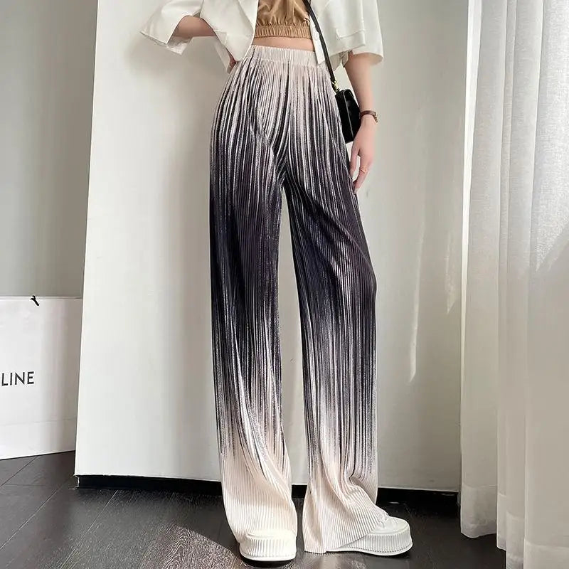 Ombre fade wide-leg pants with micro pleats, cinched high waist, and lightweight ice silk fabric