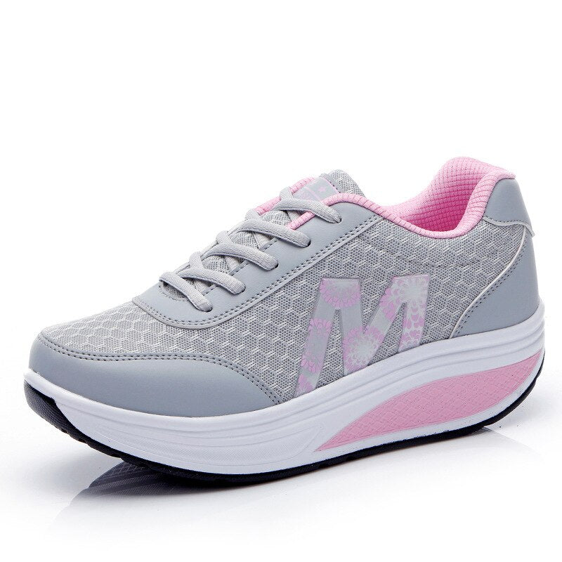 Women's comfort walking sneakers with cushioned air soles, breathable design, and posture-correcting support