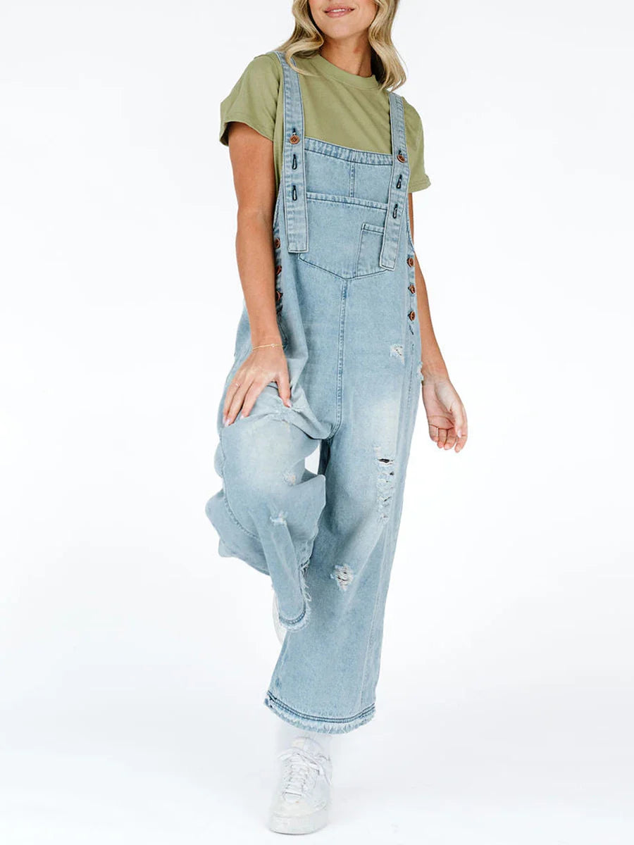 Women's washed denim overalls relaxed wide-leg fit with raw-edge distressing and adjustable straps
