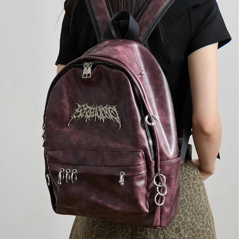Raven gothic backpack gray metallic canvas multi-pocket silver metal accent jagged-edged large capacity