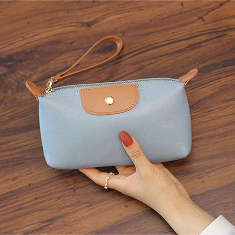 Wavlynn Anne pebbled vegan leather wristlet clutch bag with zipper closure, compact structured design