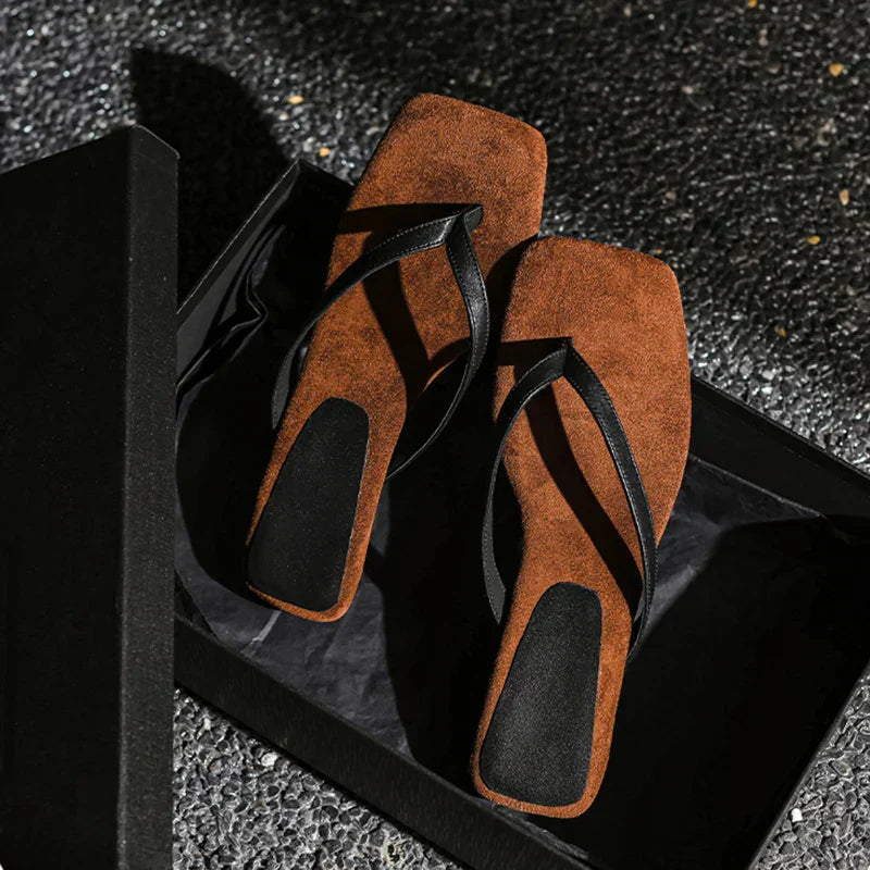Women's wedge sandals in neutral tone with elegant lines and supportive cushioned base for all-day comfort