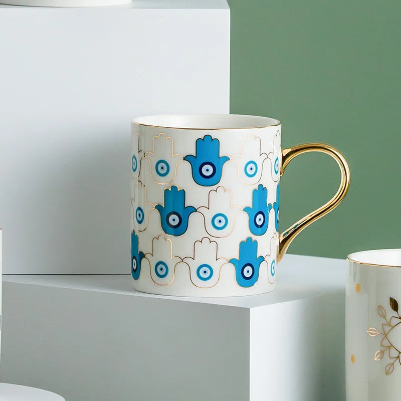 Evil Eye ceramic mug white with gold handle Turkish craftsmanship protective guardian design