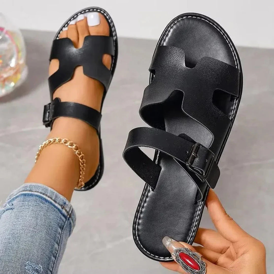 Sienna women's faux leather flat sandals in tan with cut-out design and adjustable buckle strap