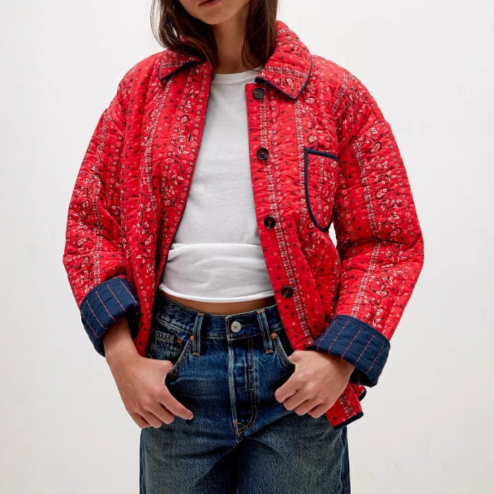 Sofia Amoretti loose quilted jacket with vertical stitching, contrast-trimmed cuffs, relaxed urban silhouette