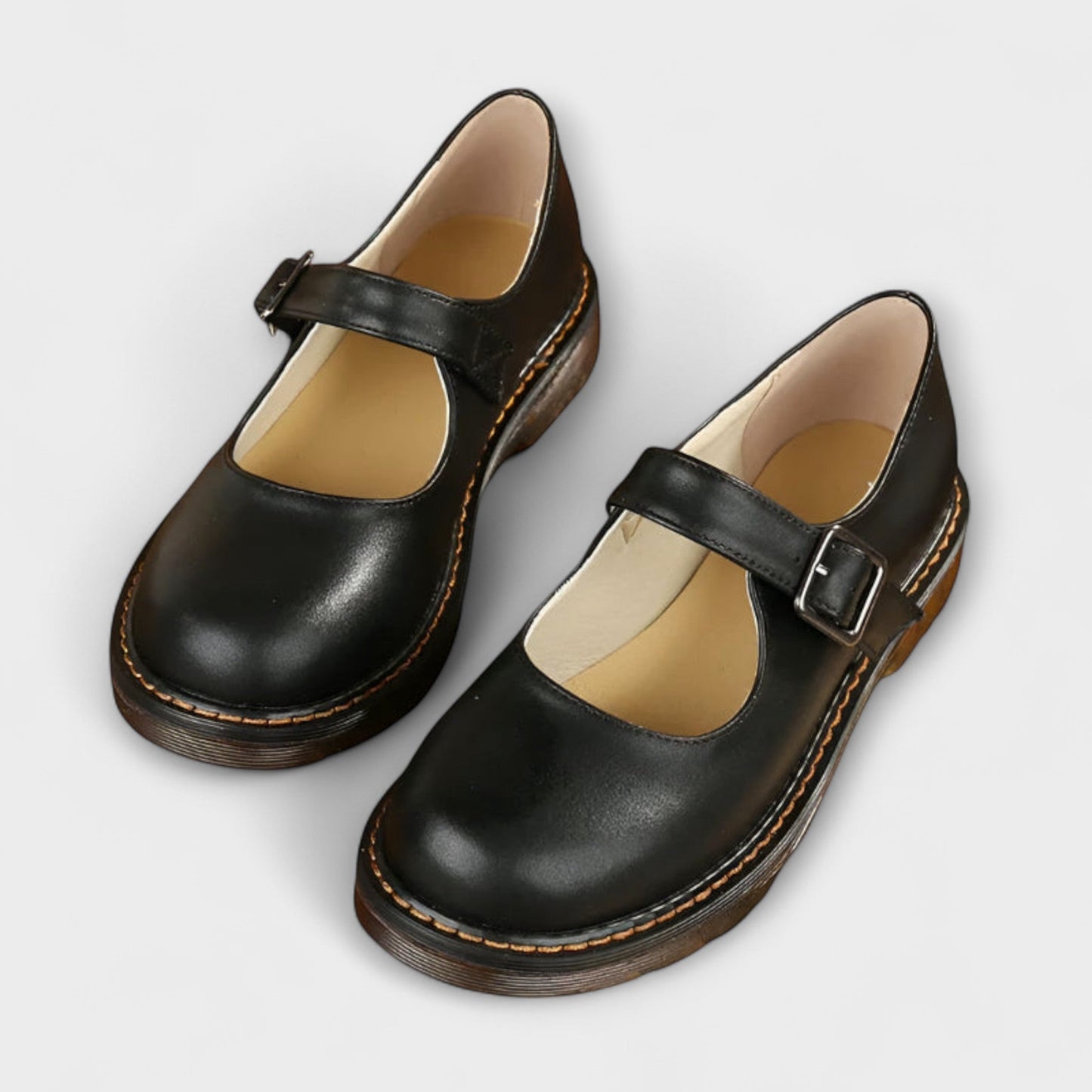 Black elegant Mary Jane shoes with cushioned insole and classic ankle strap for women