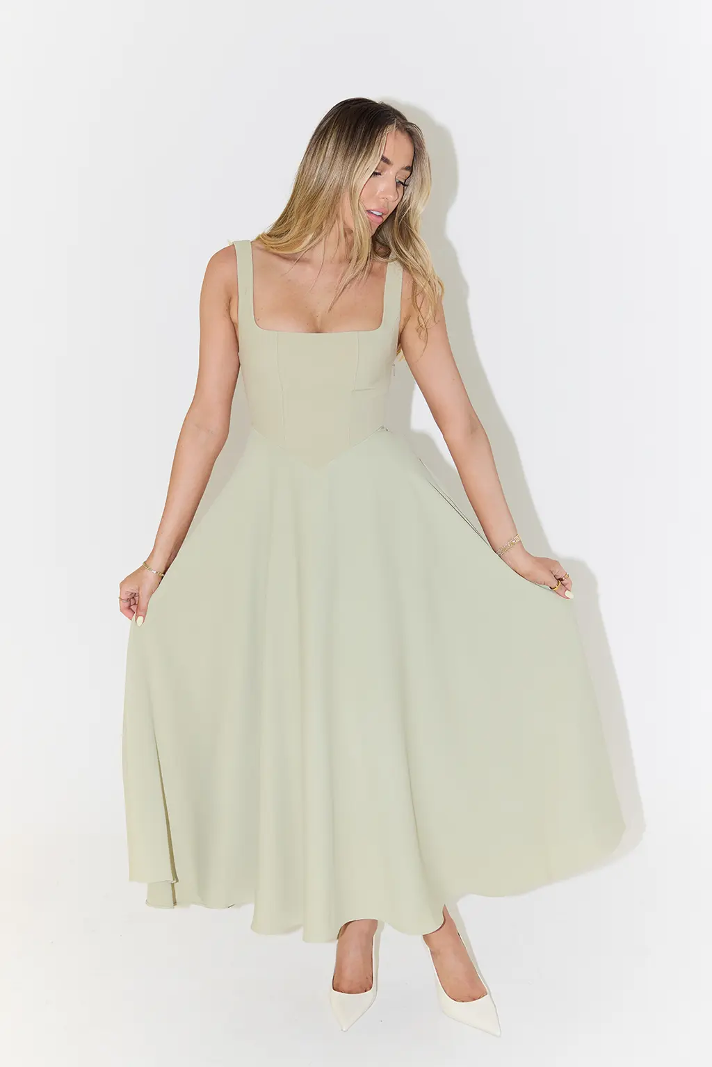 Women's sleeveless midi dress with square neckline, lightweight breathable fabric, effortless summer style