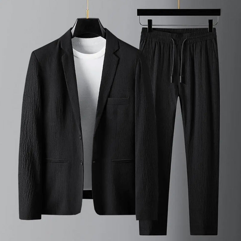 Beige relaxed-fit blazer and drawstring pants set with one-button closure, lapel collar