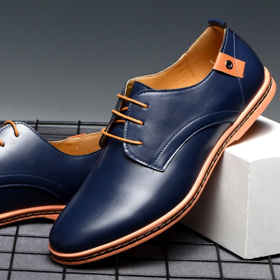 Black synthetic leather Derby shoes with clean lines and subtle contrast detailing for smart-casual style