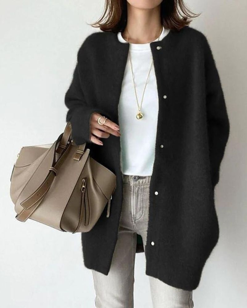 Women's oversized soft knit cardigan, button front mid-length style in neutral relaxed silhouette
