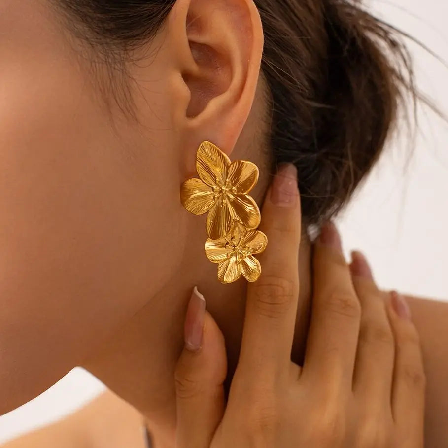 Autumn oversized gold-tone floral statement earrings with textured five-petal blossom design