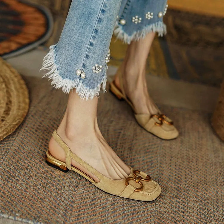 Valentina Rossi Belvì nude slingback flats with open-back design and bold oversized chain accent