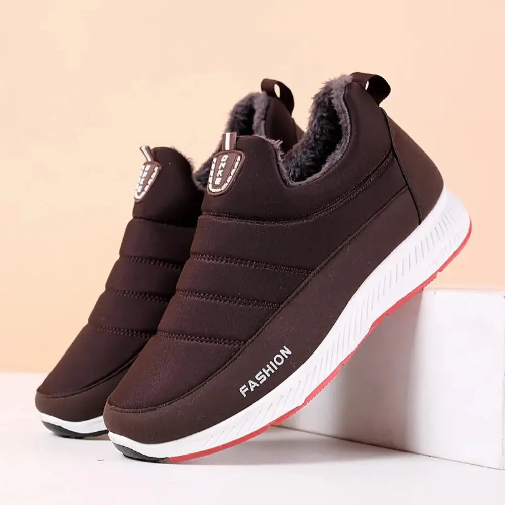 Women's white waterproof sneakers with cushioned sole, sleek low-top city style for all-weather wear