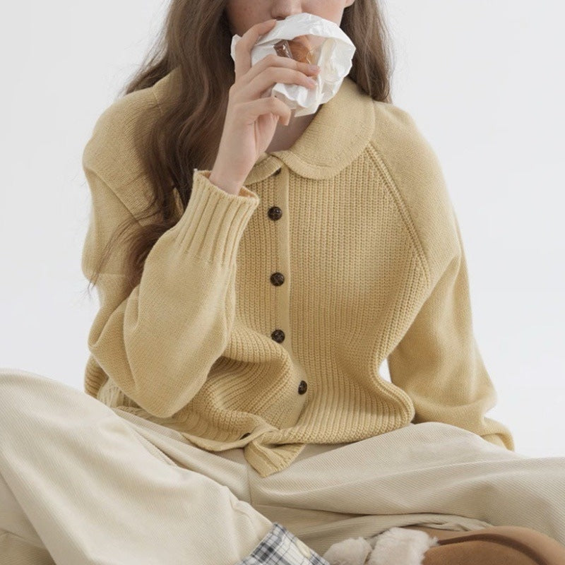 Vintage French-style cardigan with doll collar and raglan sleeves in soft retro tones