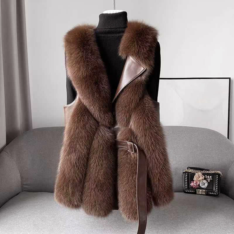 Women's ivory faux fur vest with belted waist, faux leather trim, hip-length sleeveless silhouette
