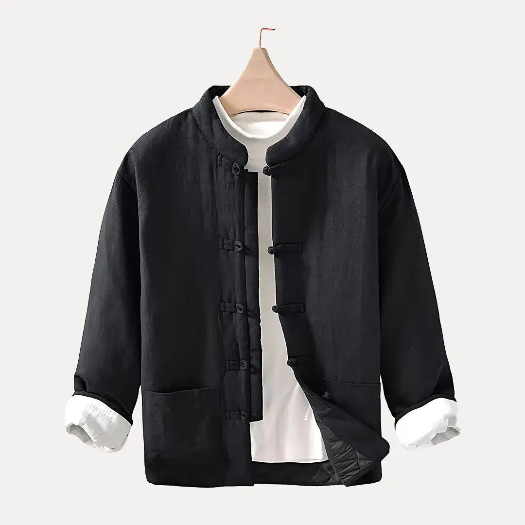 Loose-fit navy blue Chinese style padded jacket with traditional knot buttons and cotton-linen blend