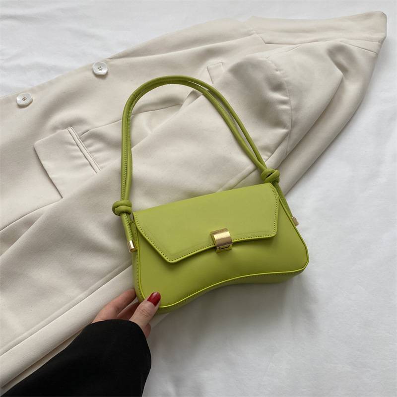 Elida minimalist shoulder bag in neutral tone with clean lines and elegant structured silhouette