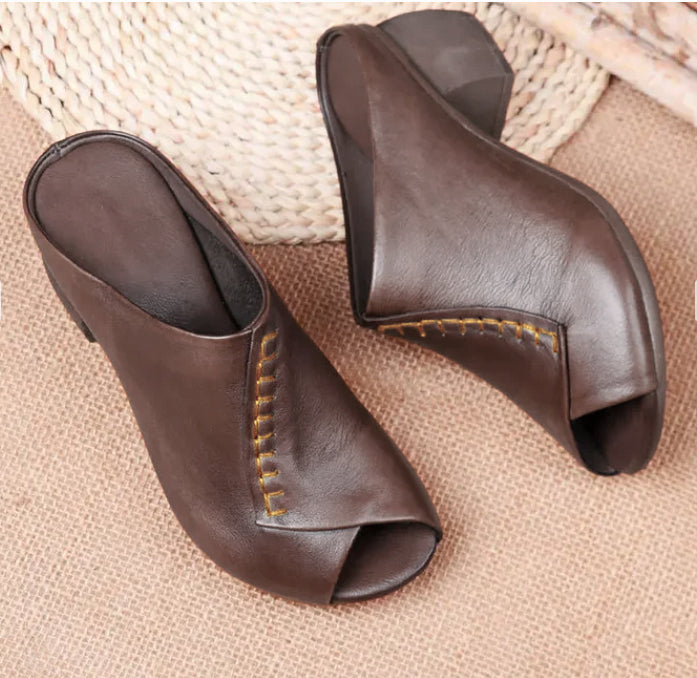 Women's cushioned slip-on sandals in neutral tones, sleek slide style with soft padded footbed