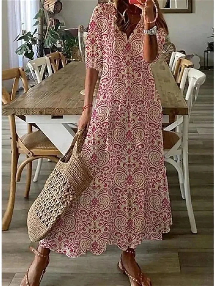 Floral maxi dress with tassel-tie V-neck, breezy boho silhouette in romantic summer print