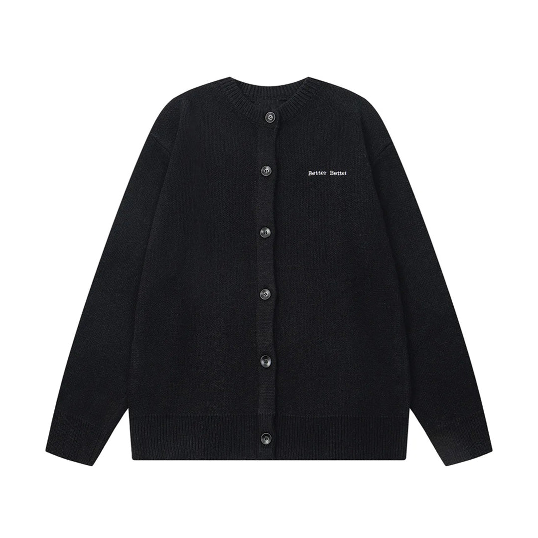 Relaxed-fit cream knit polyester cardigan with open closure, crew neck, and minimal chest embroidery