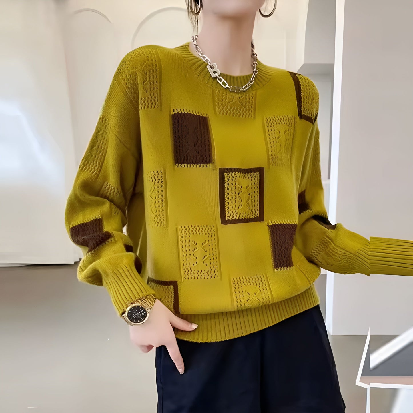 Elegant square pattern cream sweater with soft flattering fit and chic contemporary knit design