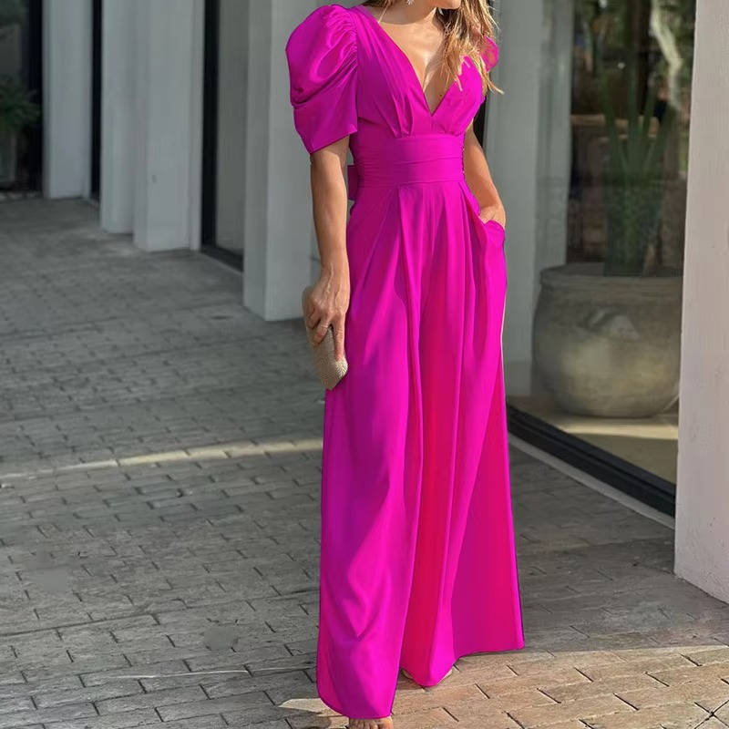 Women's elegant black wide-leg tailored jumpsuit with fitted waist and button-back formal design