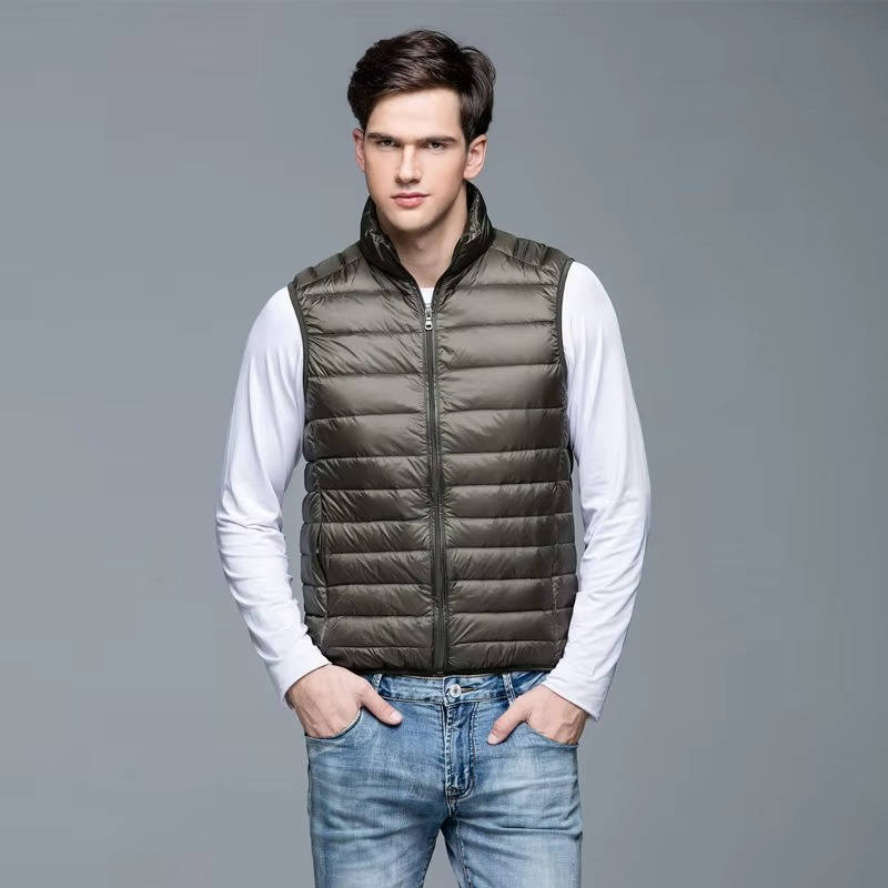 Men's lightweight navy packable down vest slim fit travel-ready insulated outerwear