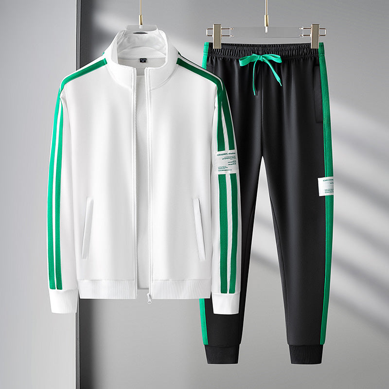 Men's black athletic tracksuit set with green stripe accents, zip-front jacket and matching joggers