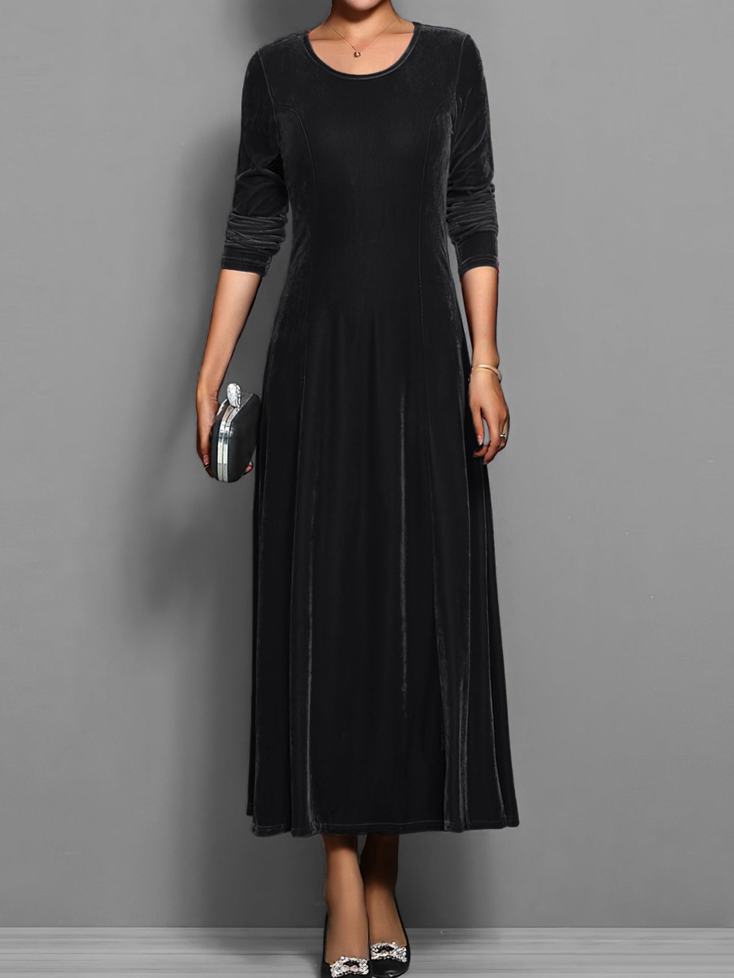 Soft velvet midi dress in rich jewel tone, elegant fitted silhouette with luxurious texture