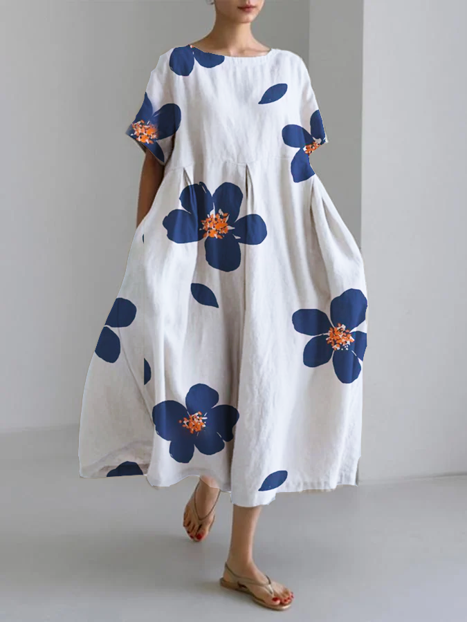 Floral maxi dress vibrant print relaxed fit pleated flowing silhouette for sunny summer days