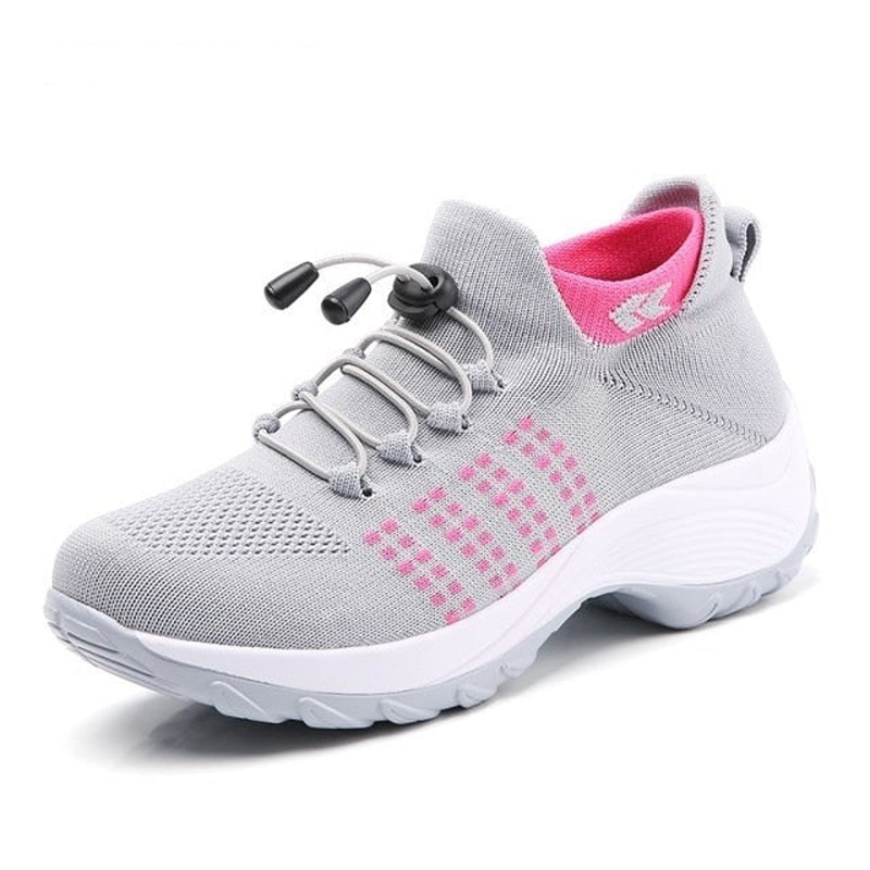 Women's orthopedic slip-on shoes in neutral tones with cushioned sole and ergonomic supportive fit