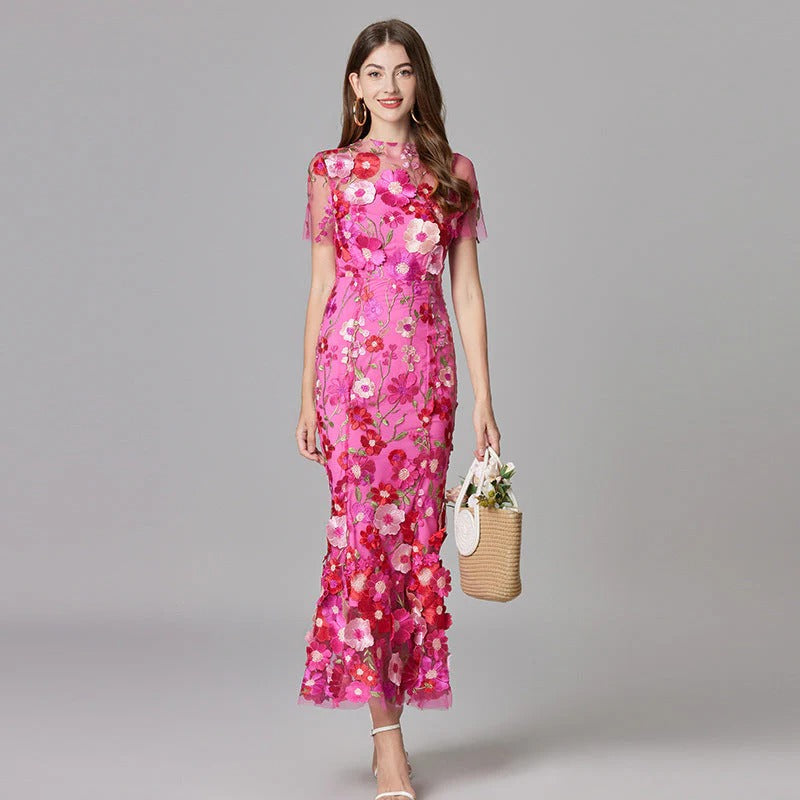 Women's sleeveless floral embroidered dress flowing silhouette delicate textured details casual elegant