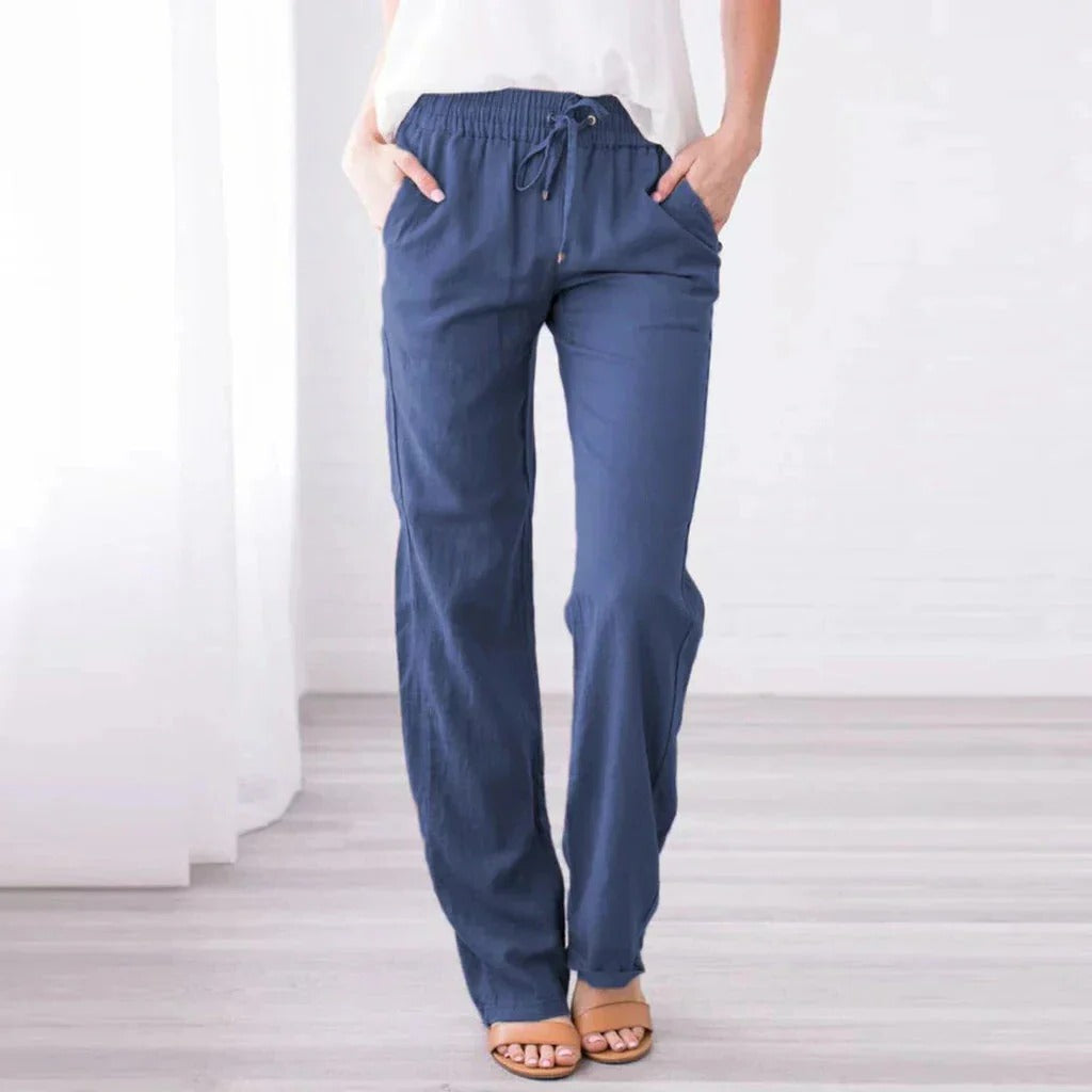 Relaxed fit women's trousers in neutral tone, loose silhouette for all-day comfort and versatility