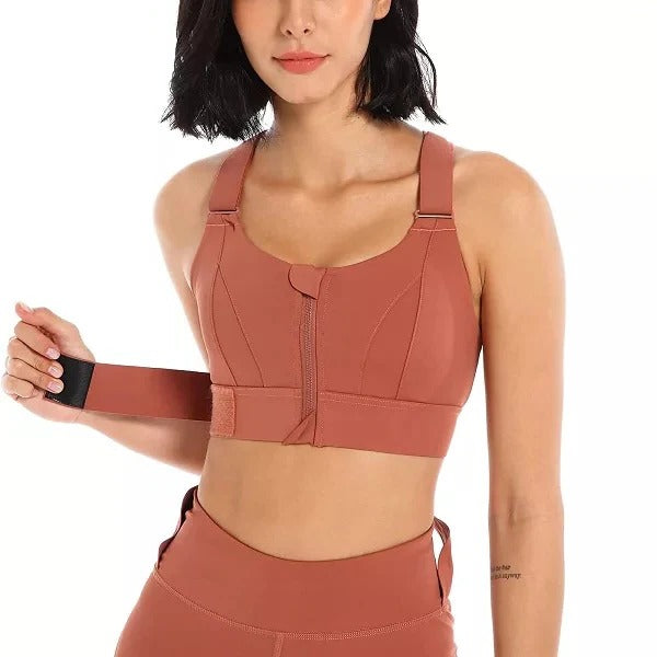 Women's high impact sports bra with adjustable straps, front-zip design for active support and comfort