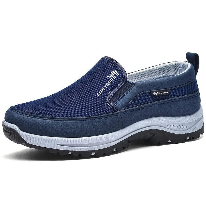 Men's gray slip-on orthopedic shoes with wide toe box, arch support, and waterproof build