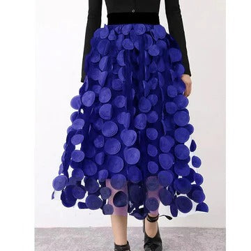 Women's polka dot tulle patchwork skirt with layered mesh overlay in elegant flowing silhouette