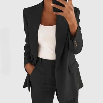 Women's tailored blazer and pants set in a classic structured fit with matching coordinated two-piece design