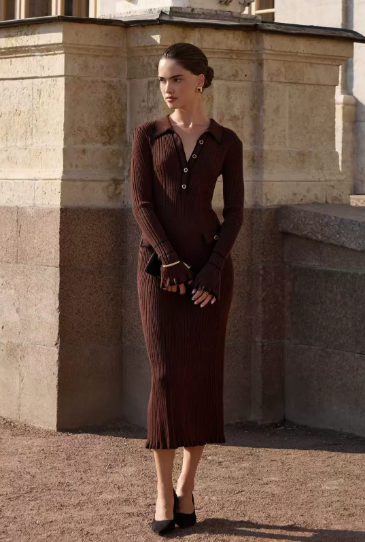Cream ribbed knit midi dress with polo collar, black contrast trim, and gold button placket