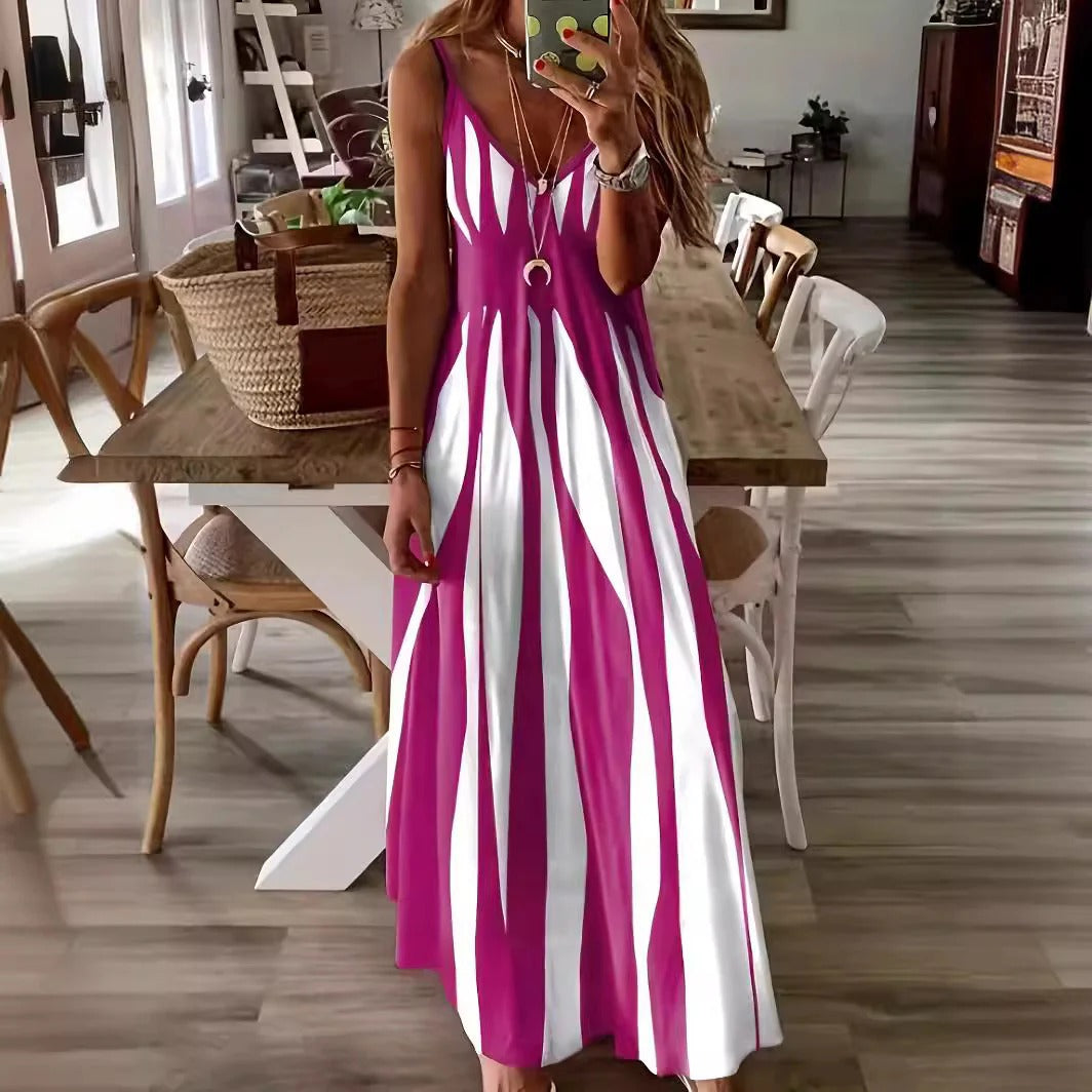 Women's flowing sleeveless maxi dress in blue and white vertical stripe with V-neck slim straps