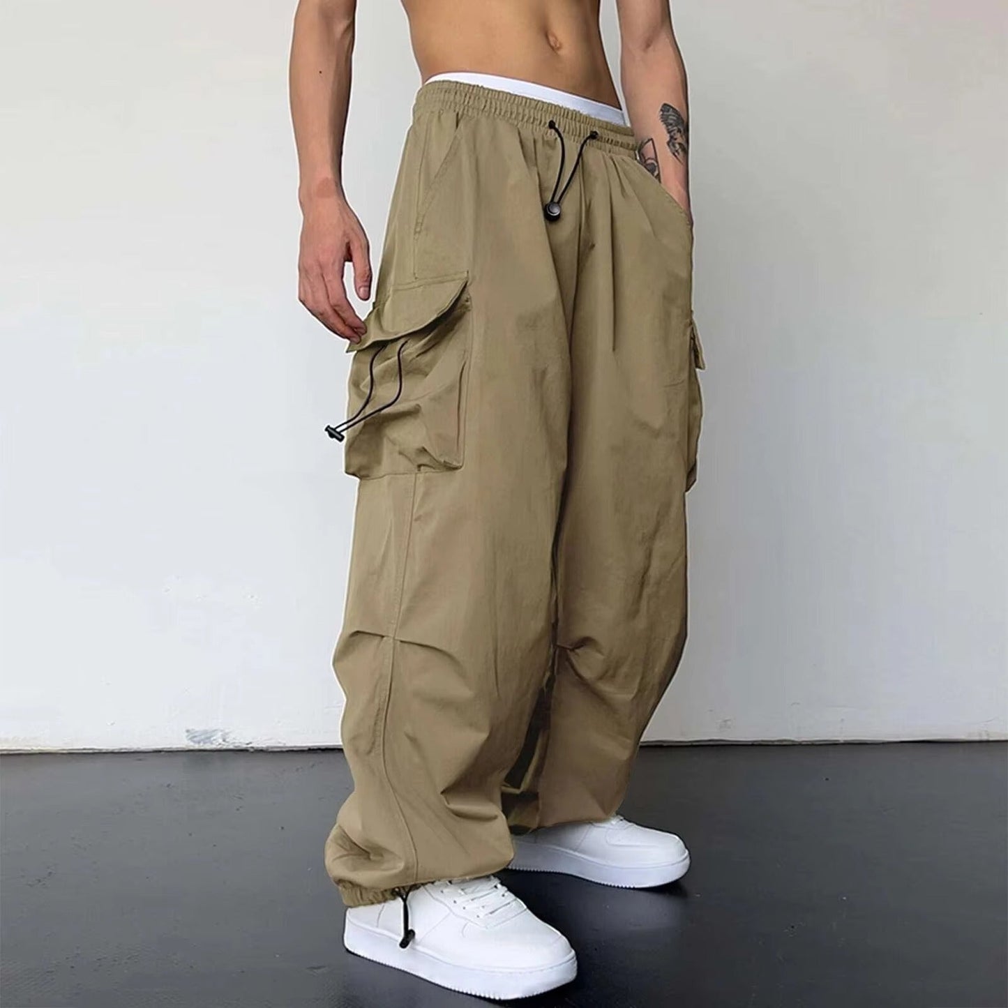 Men's baggy cargo pants wide leg relaxed fit large side pockets drawstring waist streetwear style