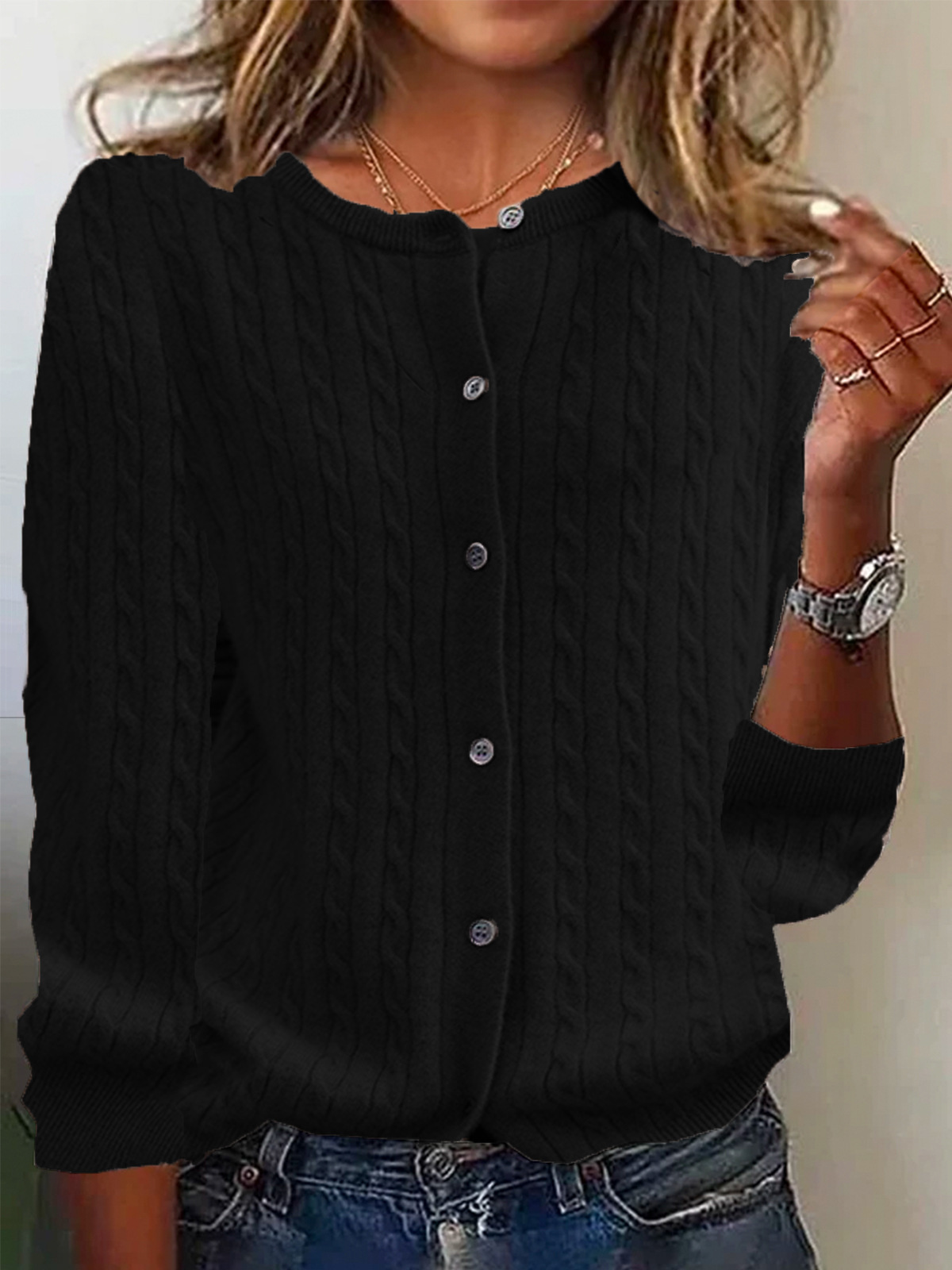 Women's cream cable knit wool cardigan, relaxed fit with button front closure and long sleeves