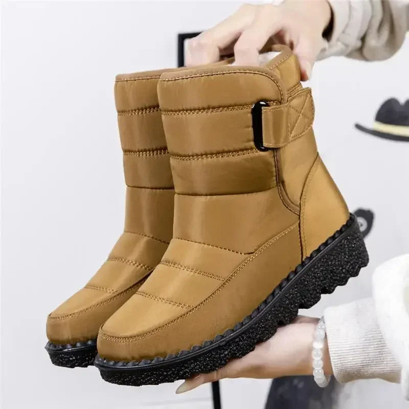 Women's black waterproof ankle boots sleek silhouette with smooth contours for all-weather wear