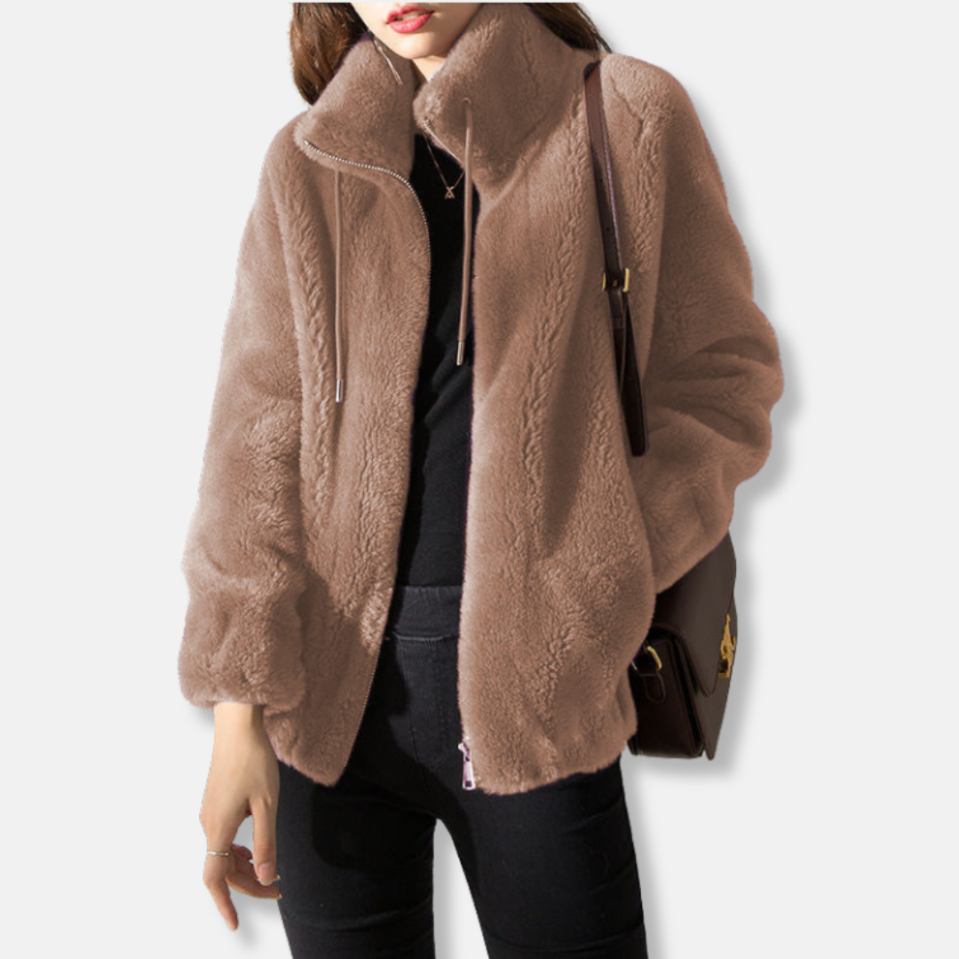 Women's cozy relaxed fit fleece jacket with stand collar, full zip closure, and elastic cuffs