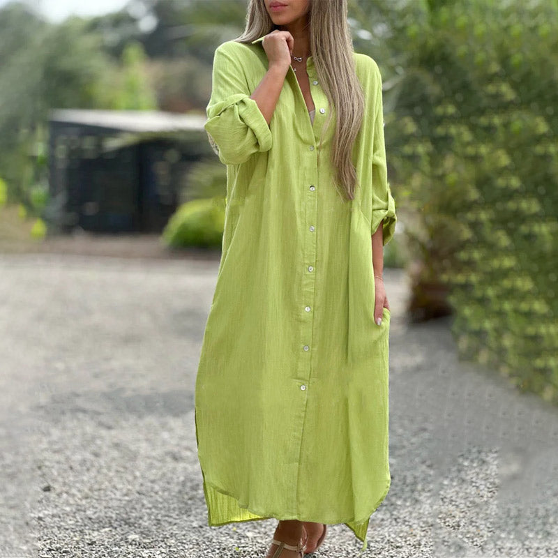 White casual button-down maxi shirt dress with tailored collar and flowing ankle-length silhouette