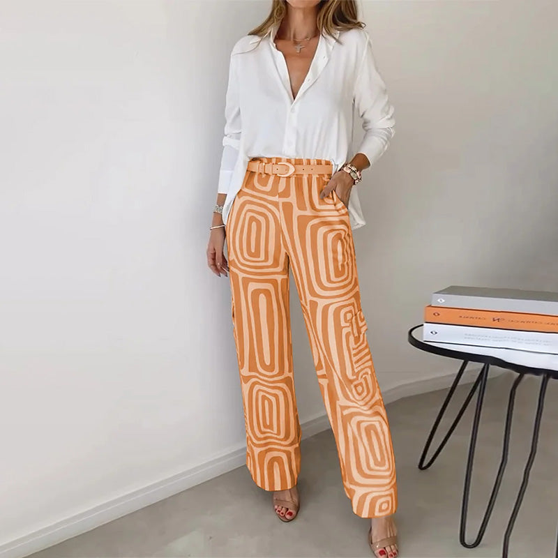Elegant ivory two-piece set with flowy button-up shirt and sleek patterned wide-leg trousers