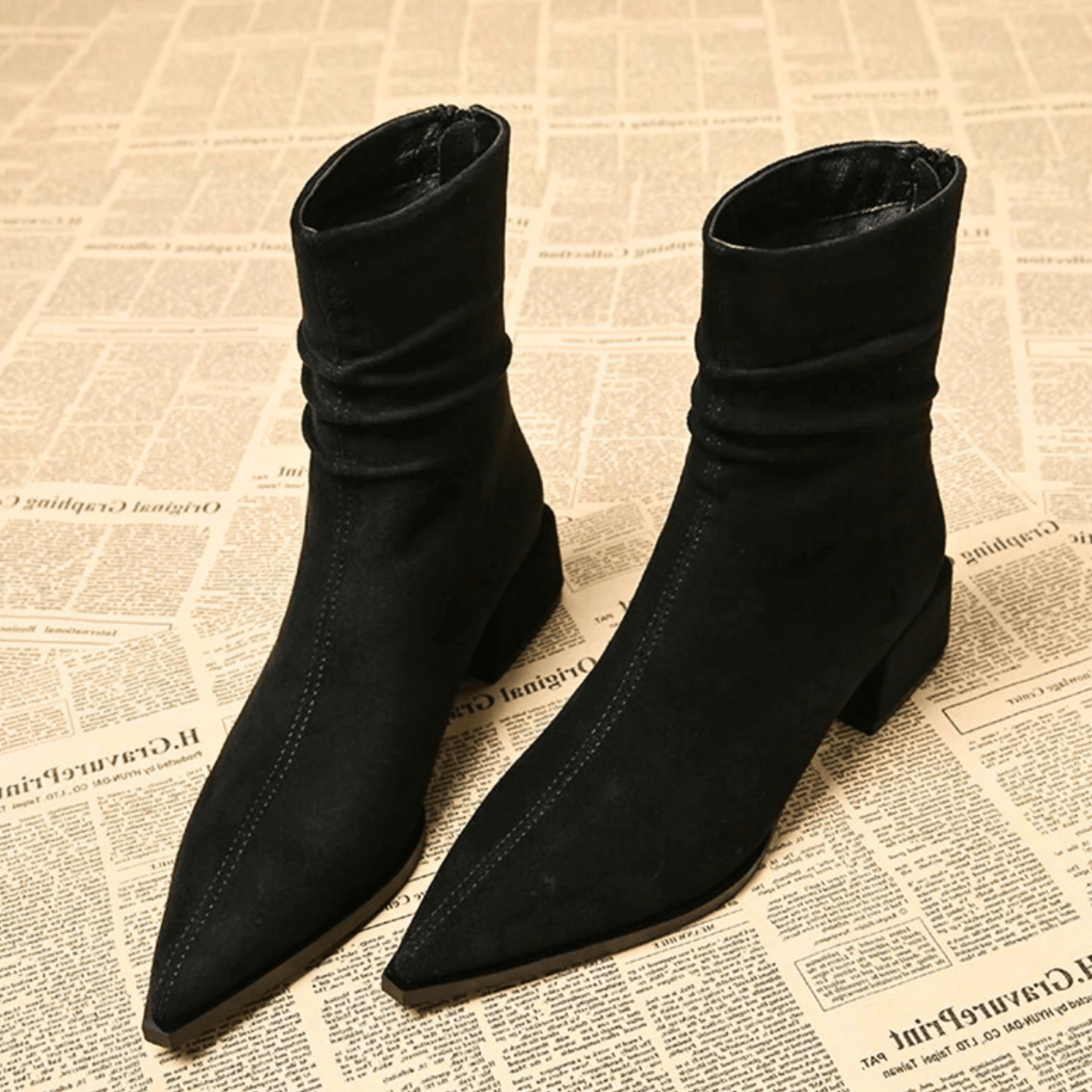 Valeria™ black knee-high boots sleek silhouette with leg-lengthening refined contours