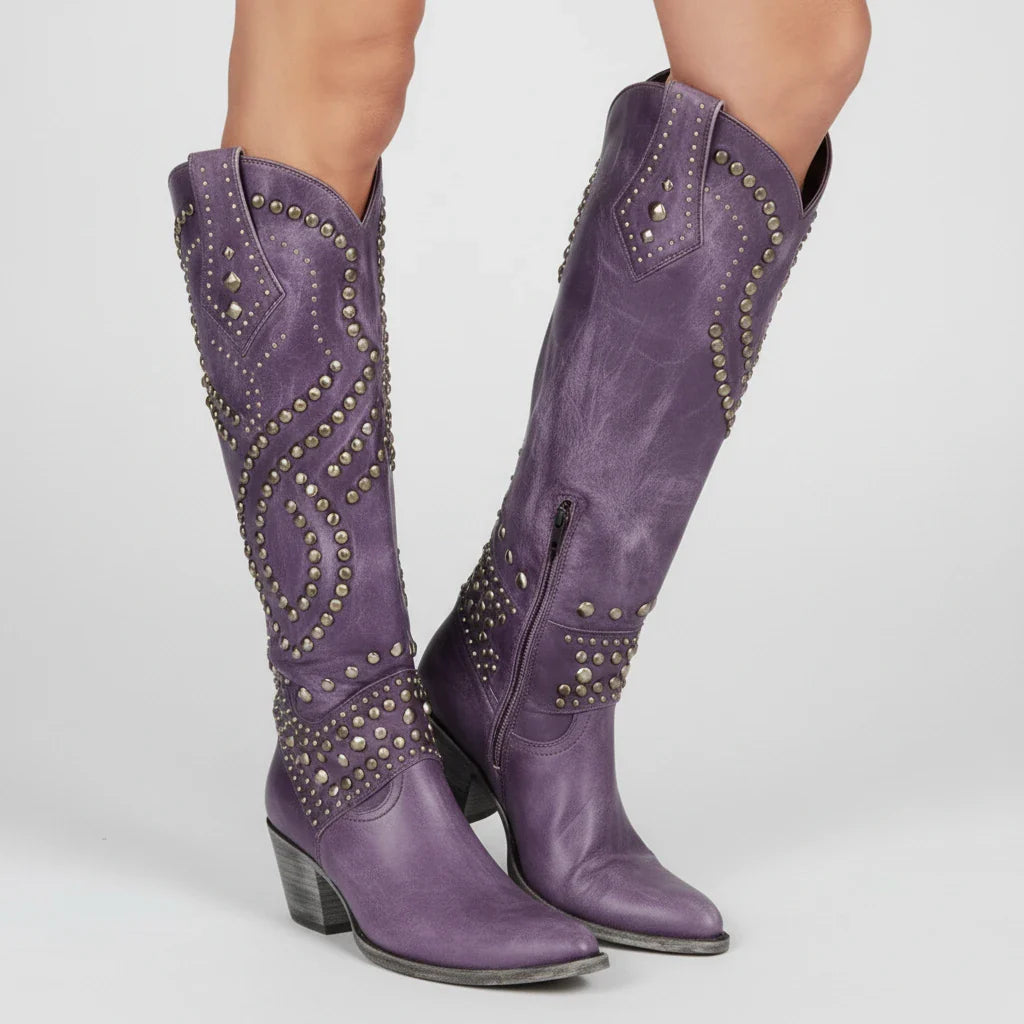 Women's knee-high studded western boots in bold cowgirl style with block heel and pointed toe