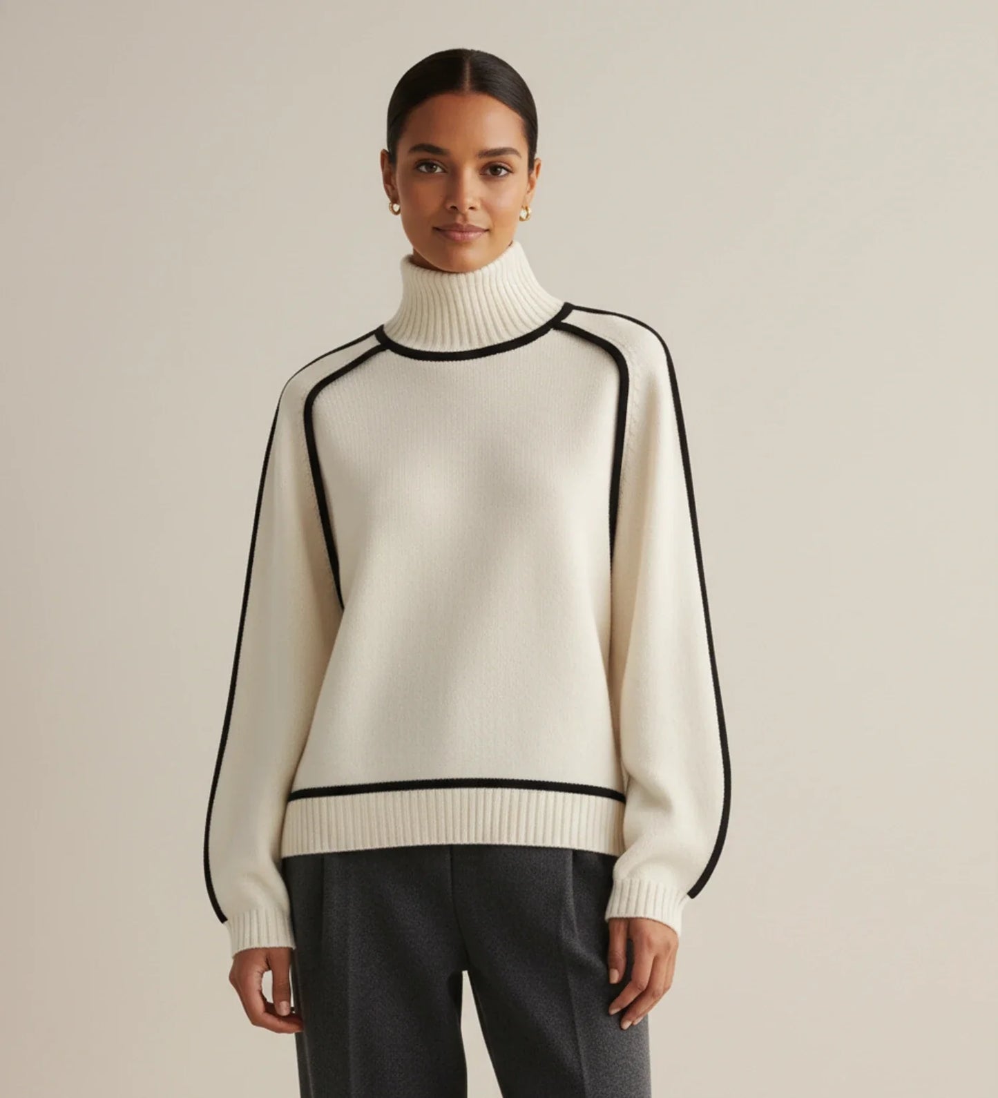 Women's relaxed fit turtleneck sweater with color block contrast trim and drop shoulder design