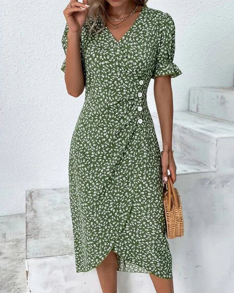 Blue floral wrap midi dress with V-neckline and adjustable waist-defining wrap-front silhouette