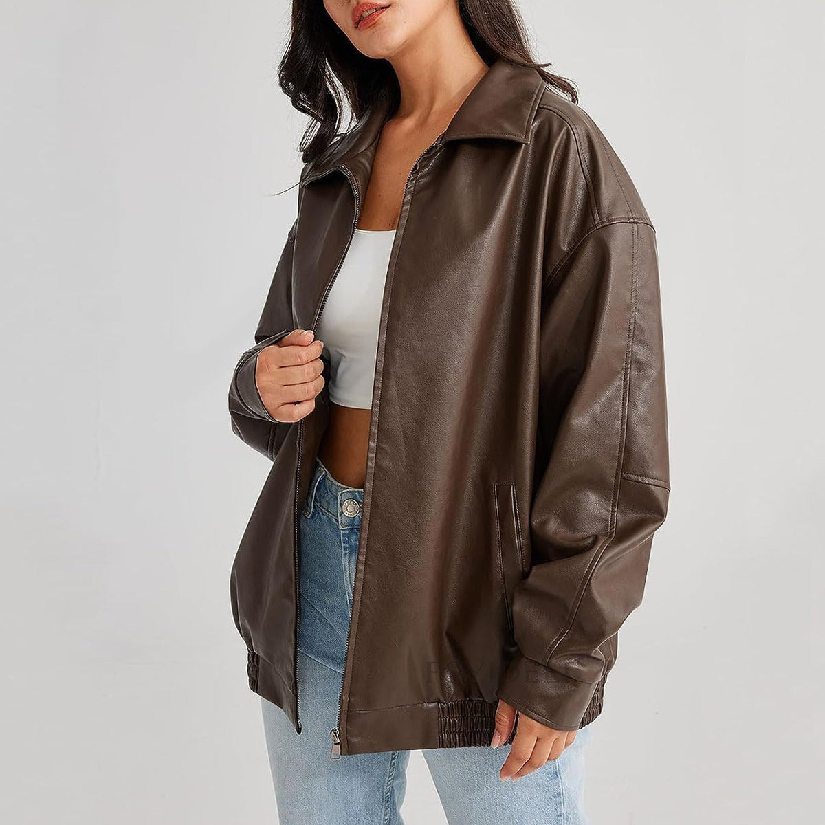 Women's oversized black leather jacket relaxed fit streetwear style with smooth zip-up front